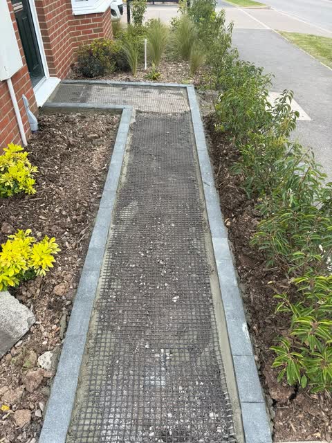 Prepared pathway with edging and reinforcement ready for surfacing